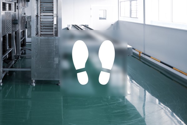 a factory floor with feet icon